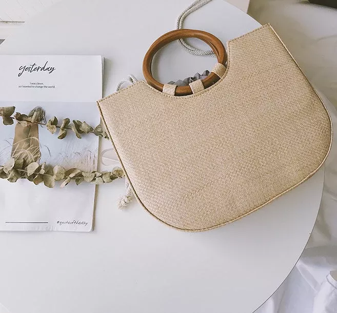 Woven palm tote with timber grip